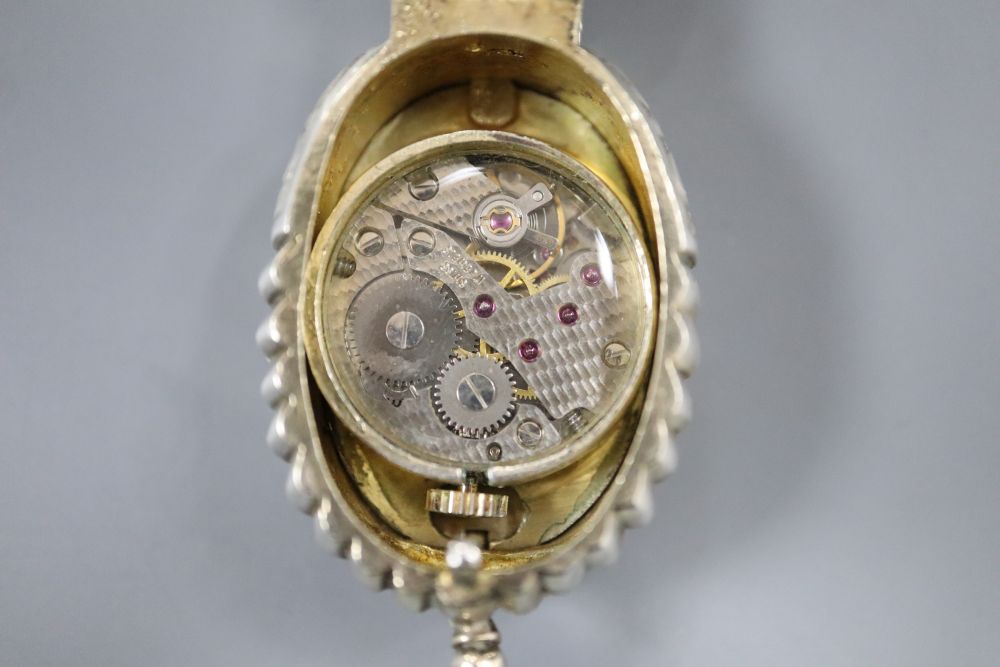 A modern limited edition St. Jamess House Company parcel gilt silver pendant watch, of shell form,